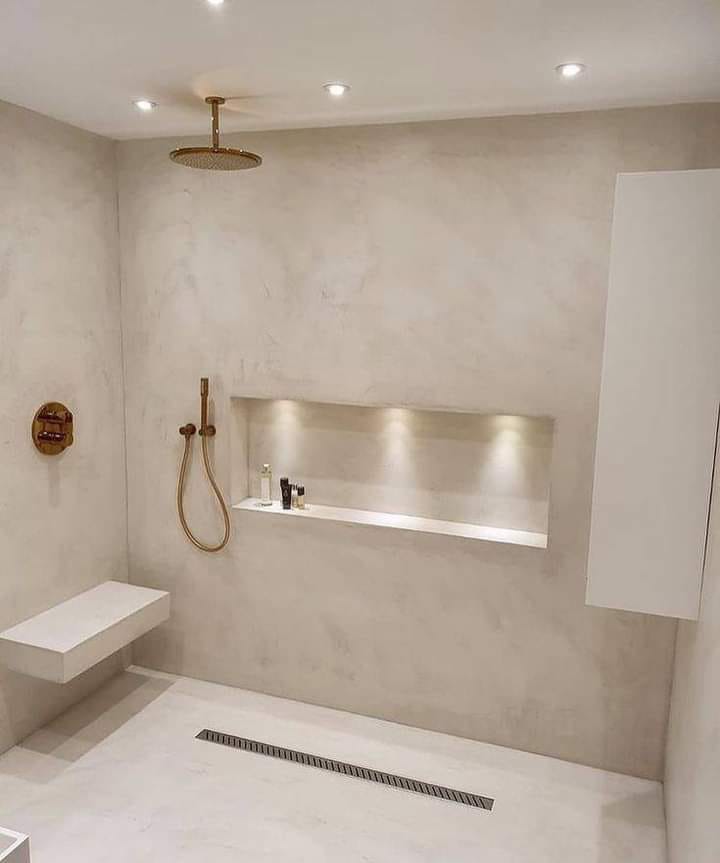 Project photo showing seamless coated walls and floor in a finished shower