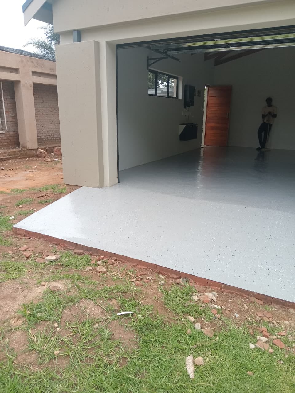 Project photo showing a floor finish at an open doorway